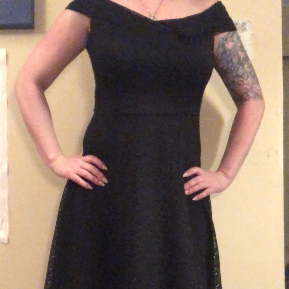 Retro lace off the shoulder black swing dress.